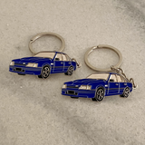 Holden VK Brock Commodore metal keyrings in formula blue and alpine white classic Aussie car gifts