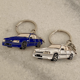 Holden VK Brock Commodore metal keyrings in formula blue and alpine white classic Aussie car gifts