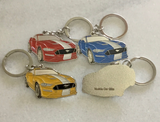 Modern Ford Mustang metal car keyrings in red, yellow, green, and blue muscle car gifts