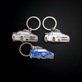 Nissan Skyline GT-R R34 metal keyrings in blue, silver, and white JDM car gifts
