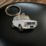 White 1974 Mini Clubman metal keychain close up view